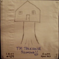 a napkin with a drawing of a house on it