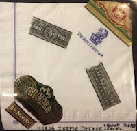 a napkin with several badges on it
