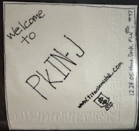 a napkin with the words welcome to pknj written on it