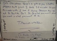 a christmas card with a handwritten note on it
